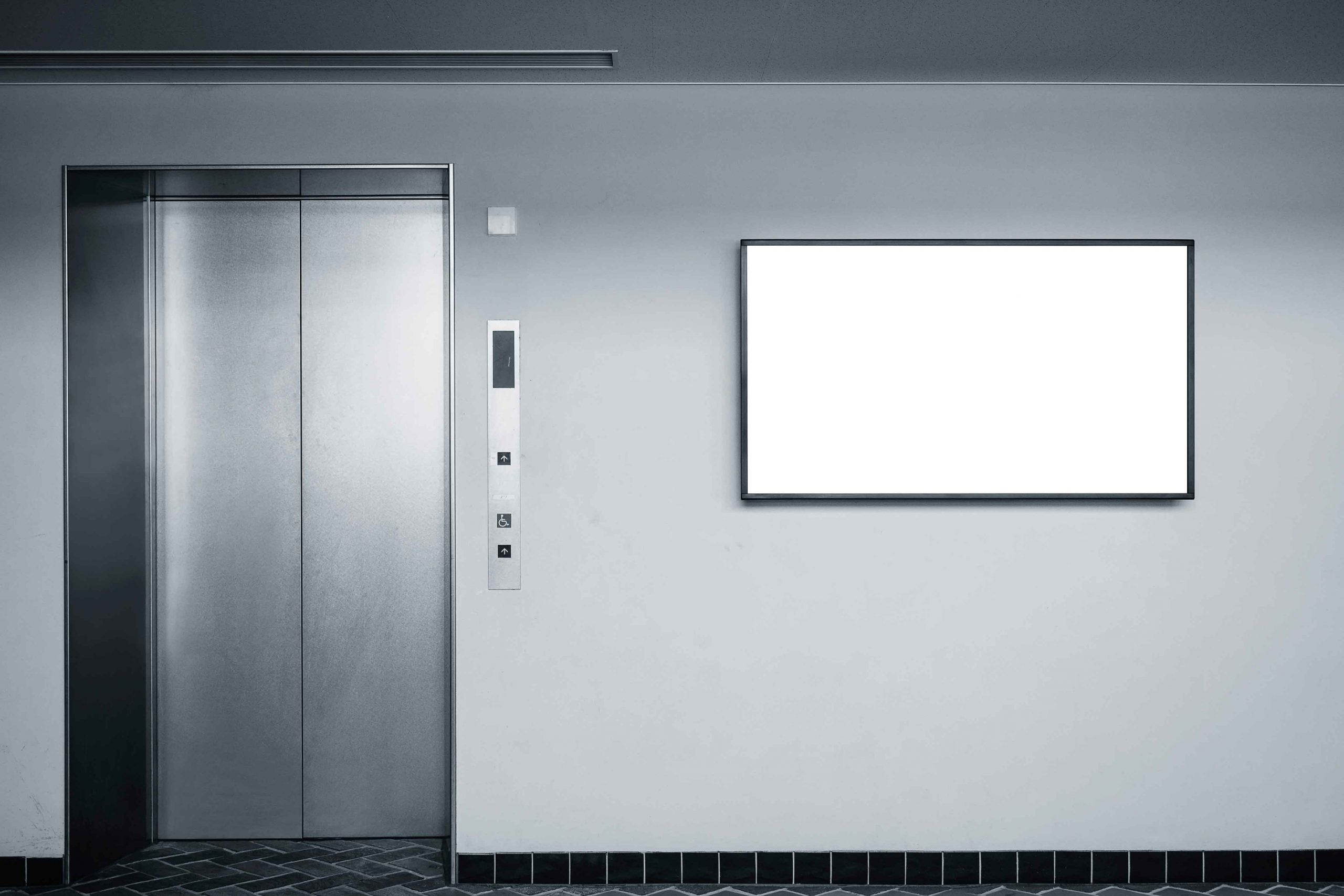 Blank Lcd screen media display on wall Indoor Building with elevator