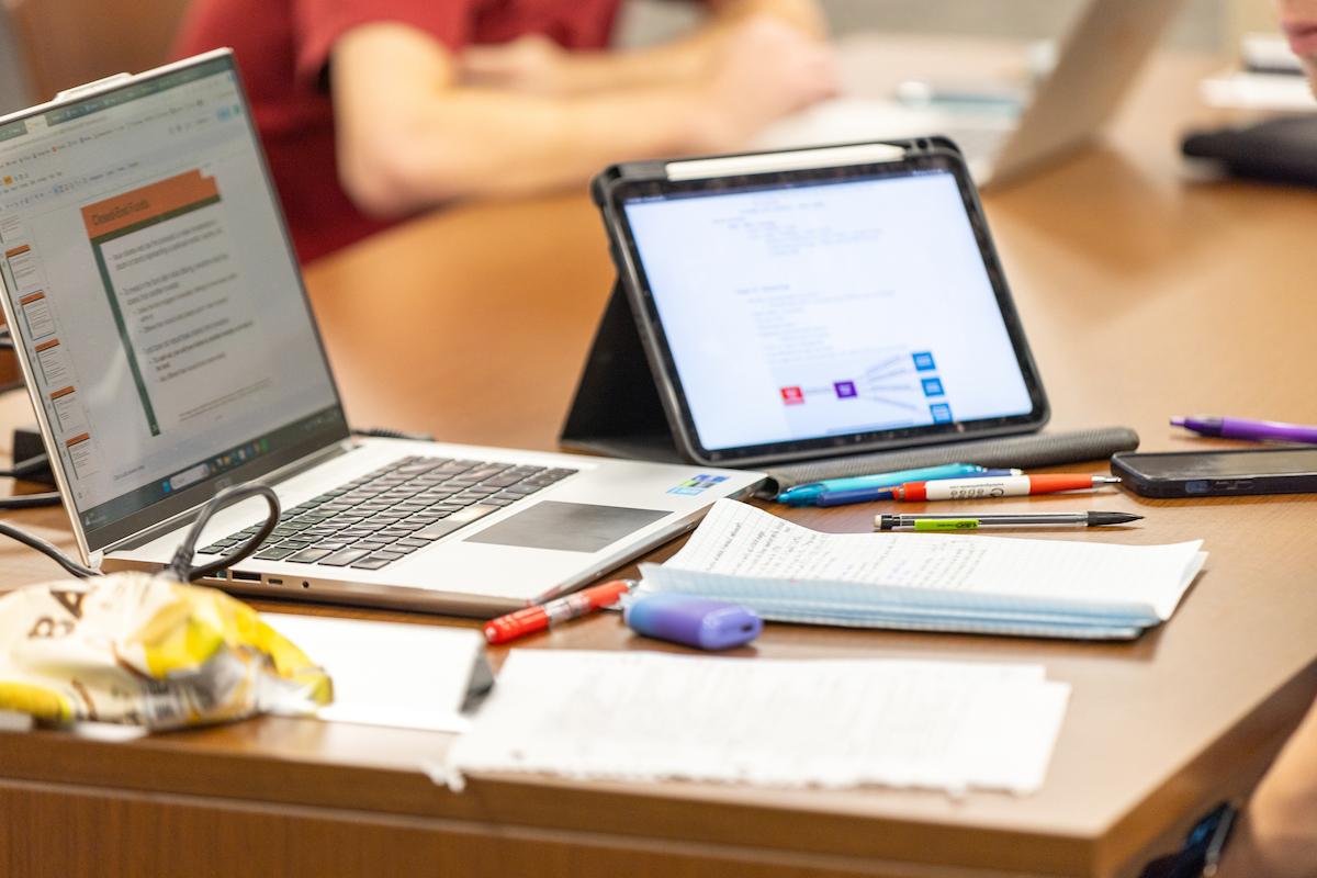 Laptop and iPad being used to study